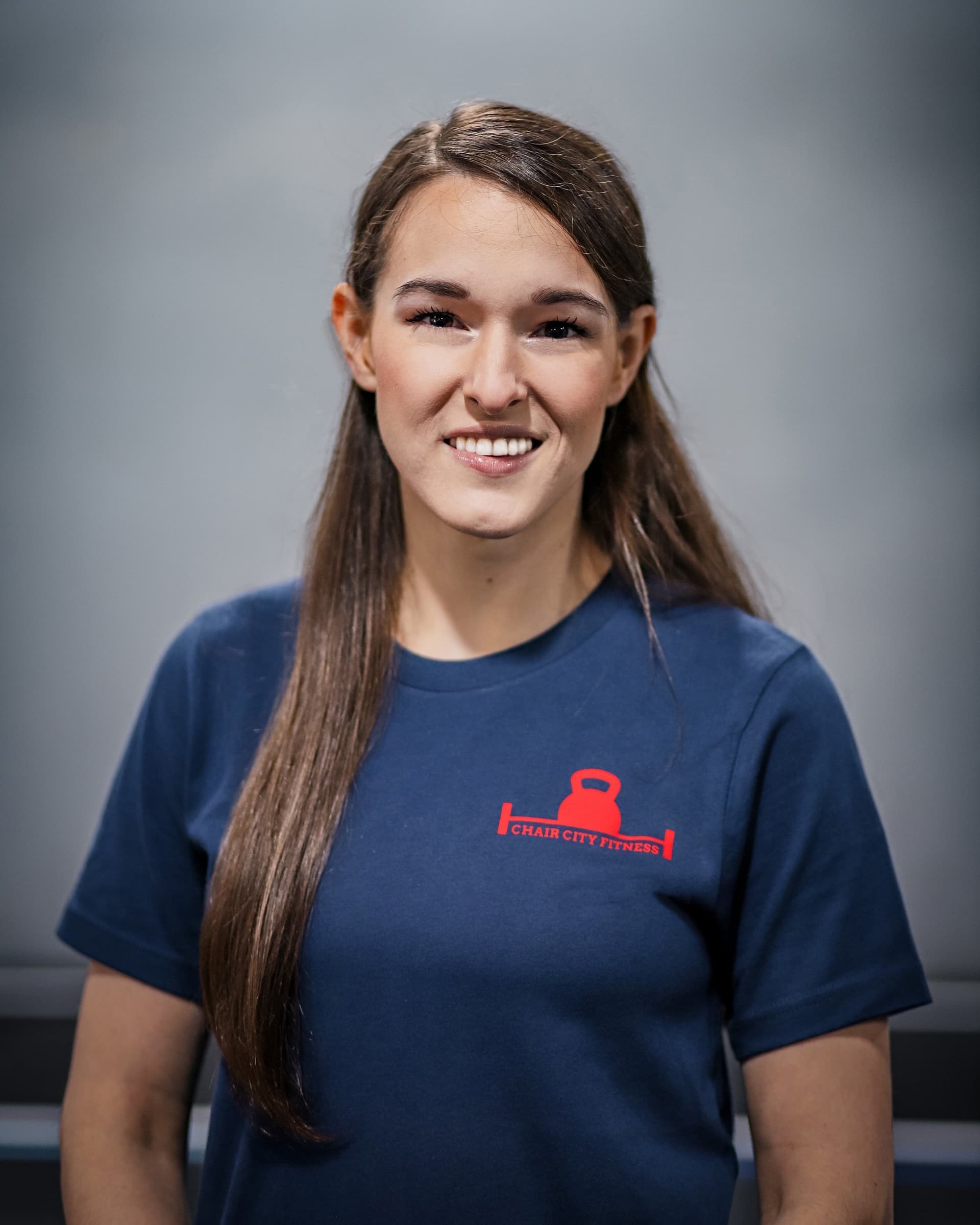 Headshot of Coach Caroline Belk