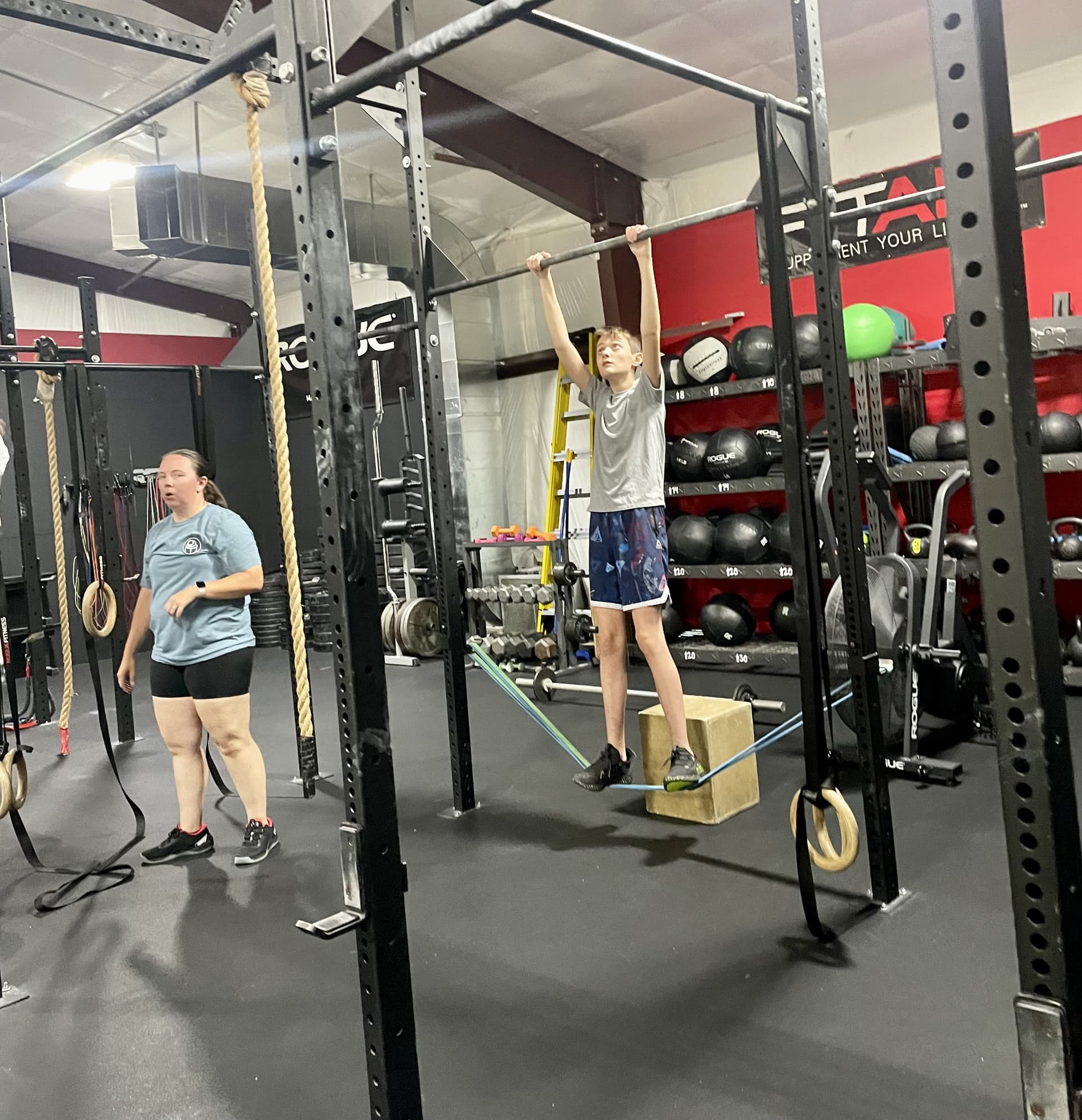 A bootcamp class using kettlebells for circuit training