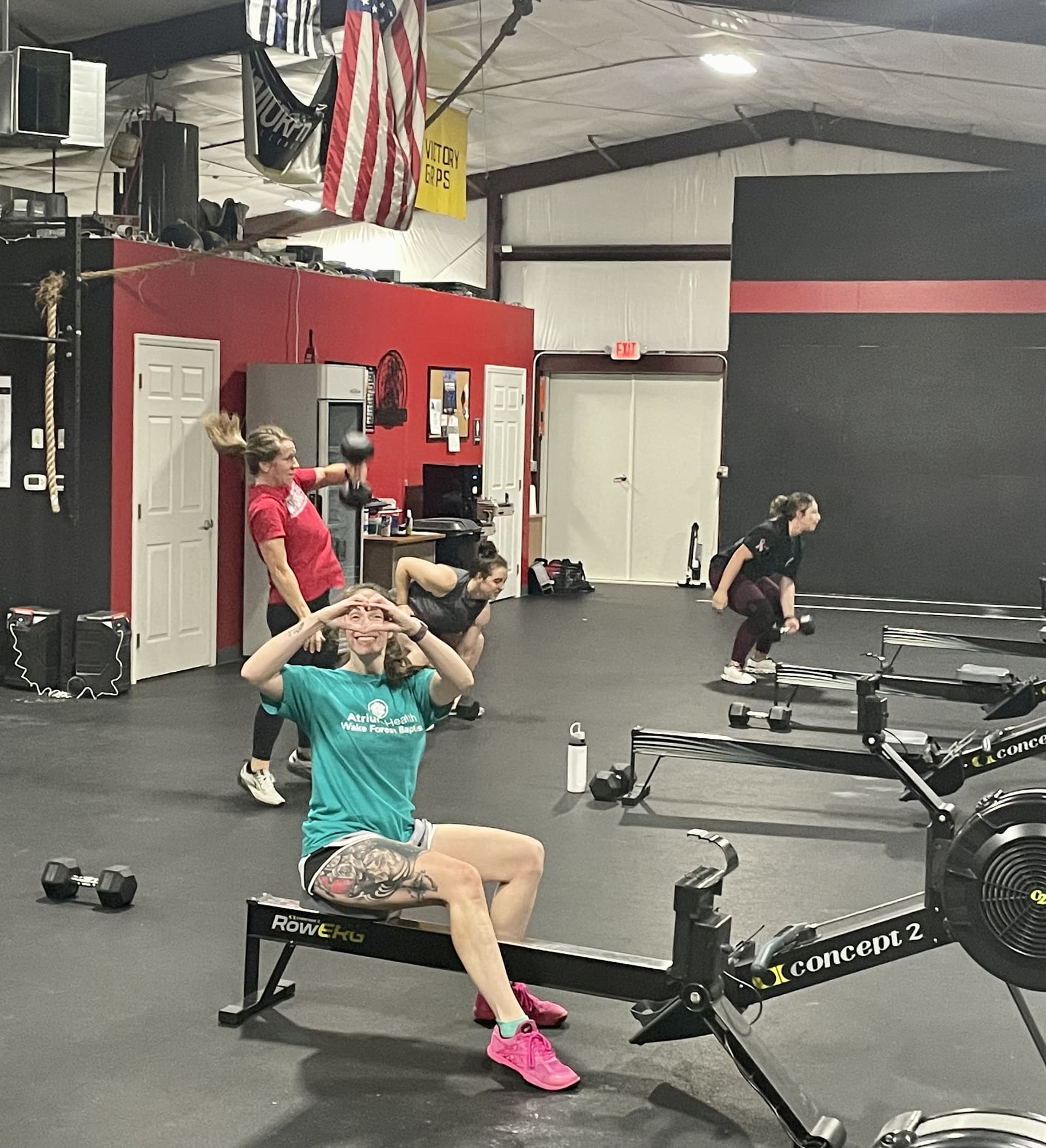 Athletes focusing on weight lifting technique